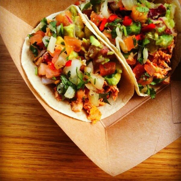 Chicken tacos made with soft corn tortillas